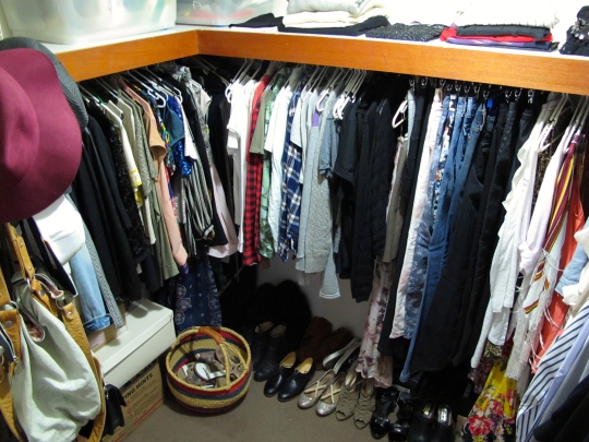 Picture of an organised walk-in wardrobe